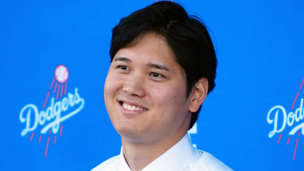 Dec 14, 2023; Los Angeles, CA, USA; Los Angeles Dodgers designated hitter Shohei Ohtani is introduced at a press conference at Dodger Stadium. Mandatory Credit: Kirby Lee-USA TODAY Sports